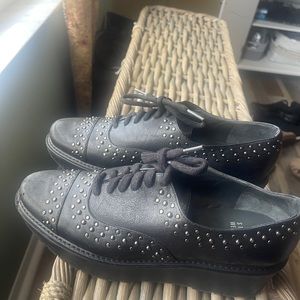 Stuart Weitzman Spectator style black 2 inch platform tie shoe.